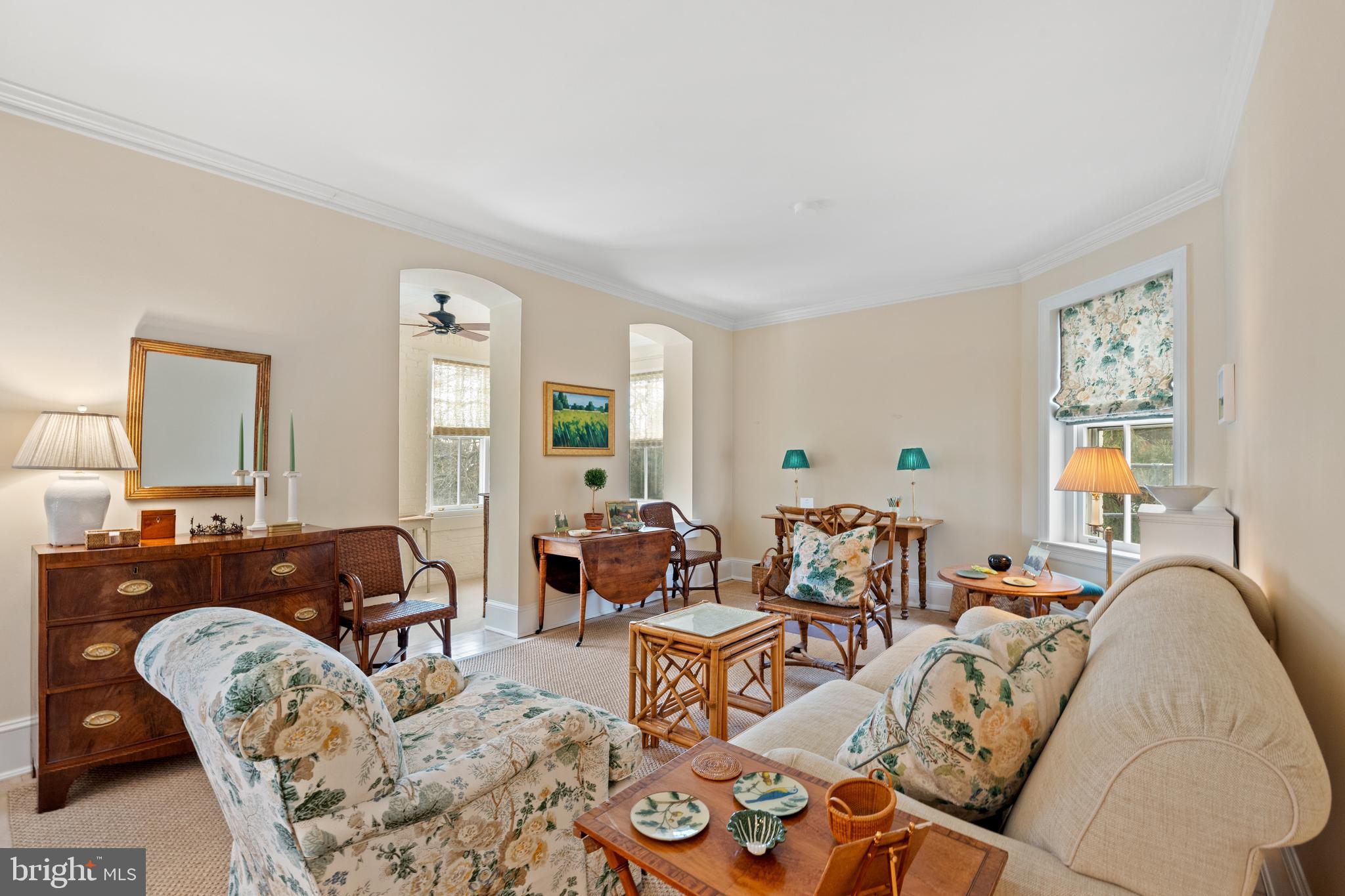 1657 31st Street Northwest, Unit 206 Washington, DC 20007 - Photo 4 of 26 a living room with furniture and wooden floor