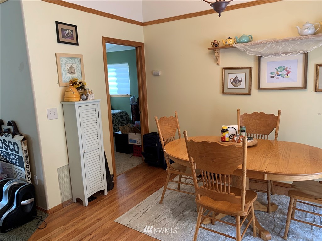 2013 Tucannon Road Pomeroy, WA 99347 - Photo 9 of 28 a dining room with furniture and wooden floor