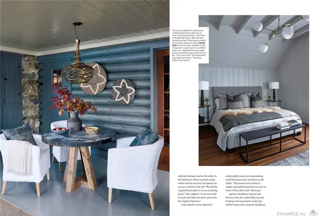 a bedroom with furniture and a chandelier