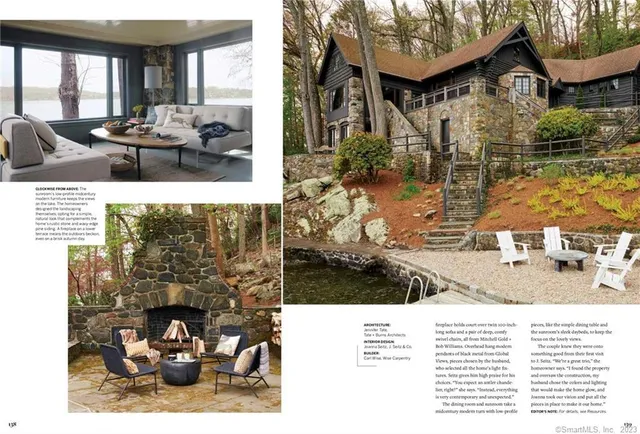 a view of living room filled with furniture and floor to ceiling windows