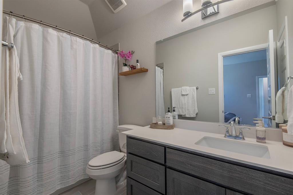16650 Nightshade Road Frisco, TX 75033 - Photo 27 of 40 a bathroom with a sink and a toilet