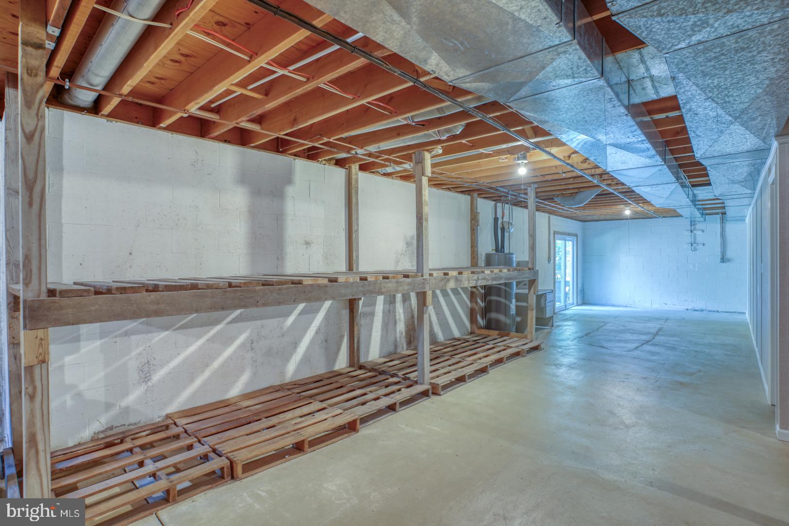 535 Stenning Drive Hockessin, DE 19707 - Photo 25 of 34 Basement Storage and Walkout