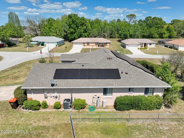 a view of a house with a swimming pool