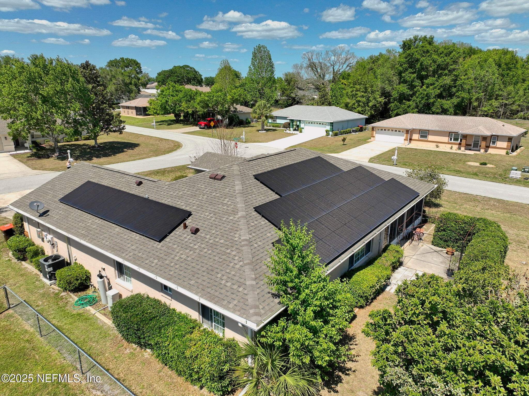 10121 Southwest 61st Terrace Road Ocala, FL 34476 - Photo 16 of 49 Barbara aerial rear solar panels