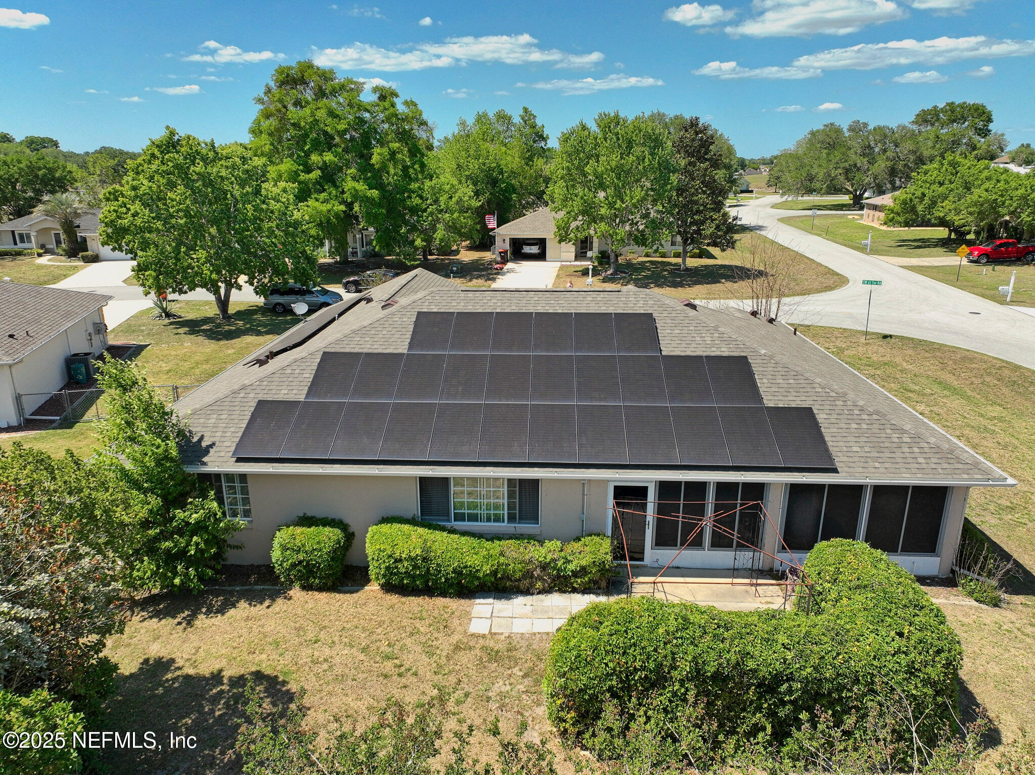 10121 Southwest 61st Terrace Road Ocala, FL 34476 - Photo 17 of 49 Barbara aerial rear yard solar