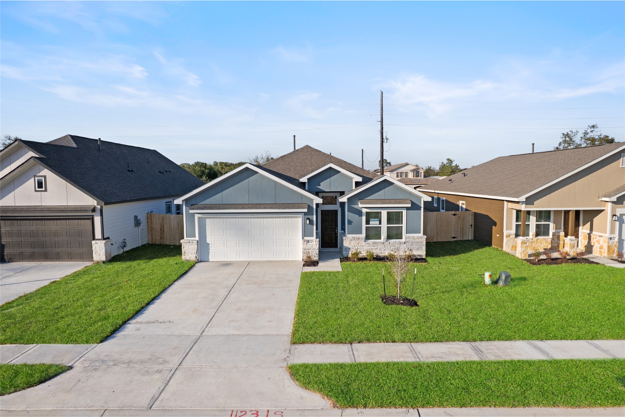 1123 Santee Court Rosharon, TX 77583 - Photo 2 of 30 a front view of a house with a yard