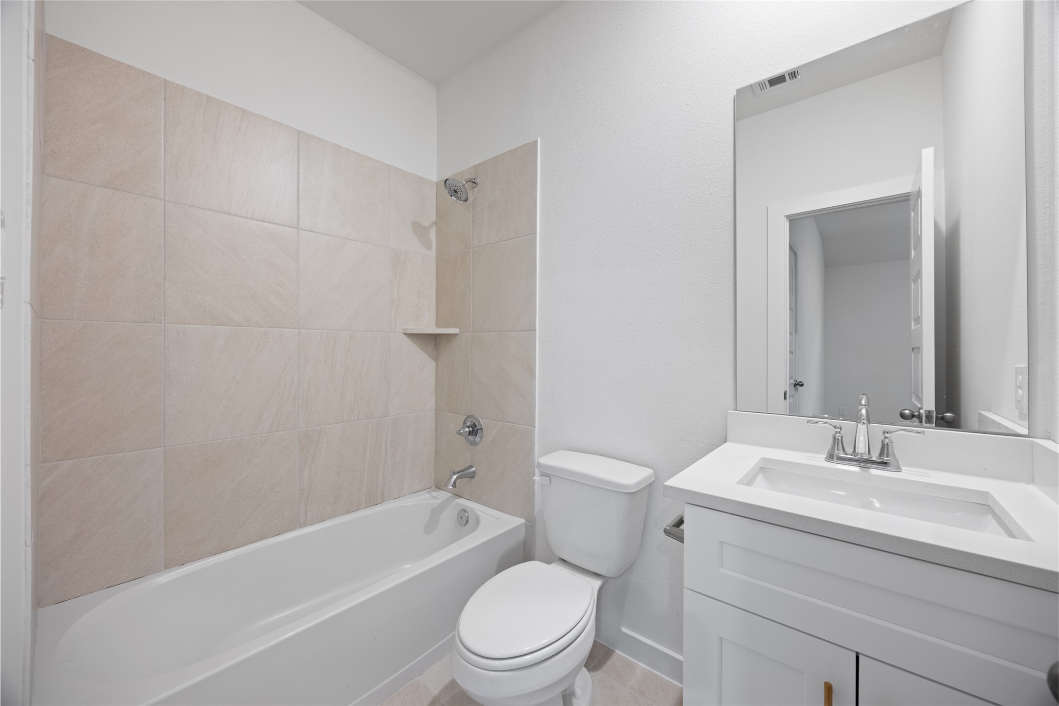 1123 Santee Court Rosharon, TX 77583 - Photo 27 of 30 a bathroom with a sink a toilet a mirror a bathtub and shower