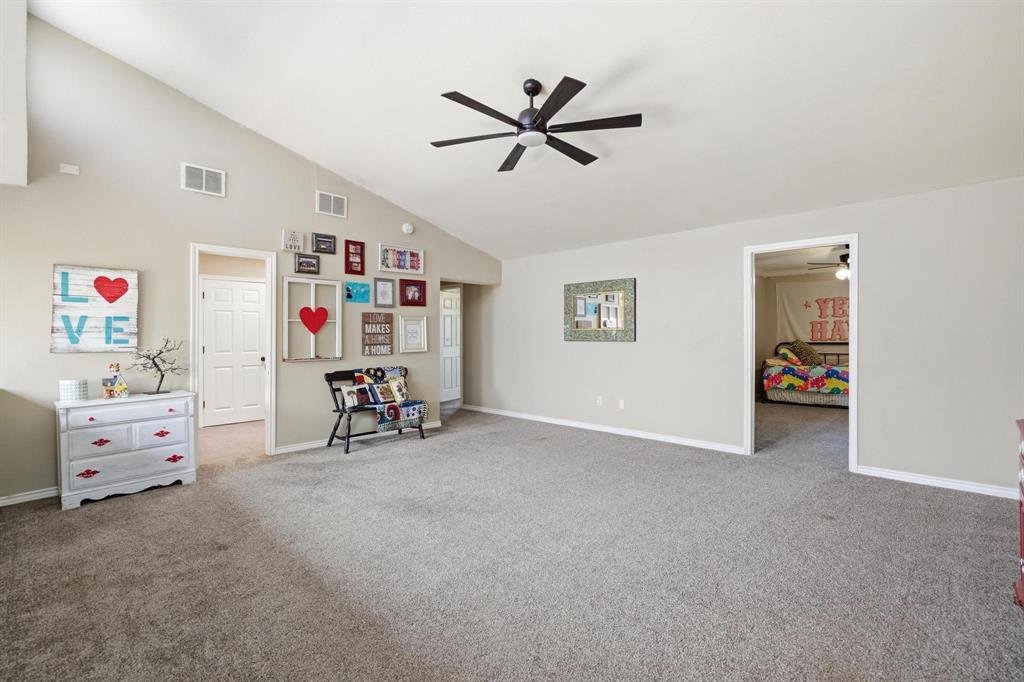 432 Clark Road Abilene, TX 79602 - Photo 21 of 40 a view of a livingroom with furniture and a fan