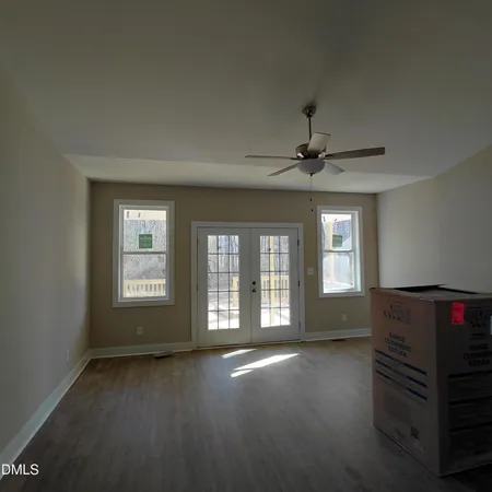 a view of livingroom with hardwood floor and window