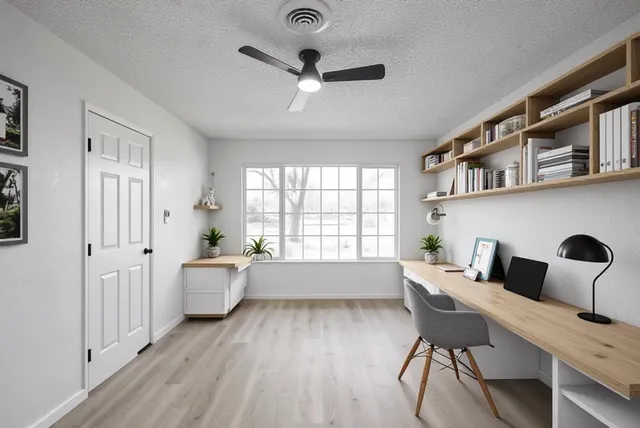 a workspace with furniture window and wooden floor