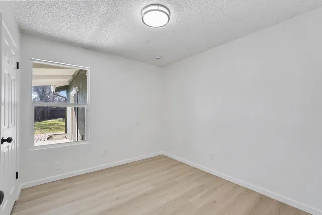 an empty room with a window