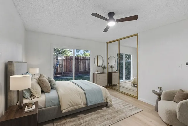 a bed room with a bed and a couch