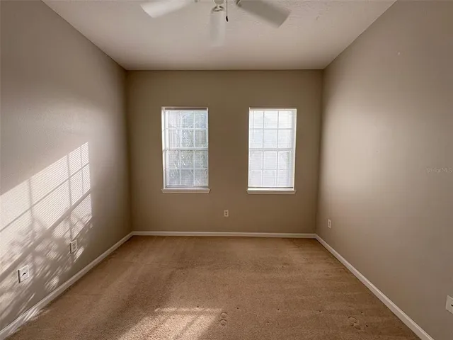 an empty room with windows