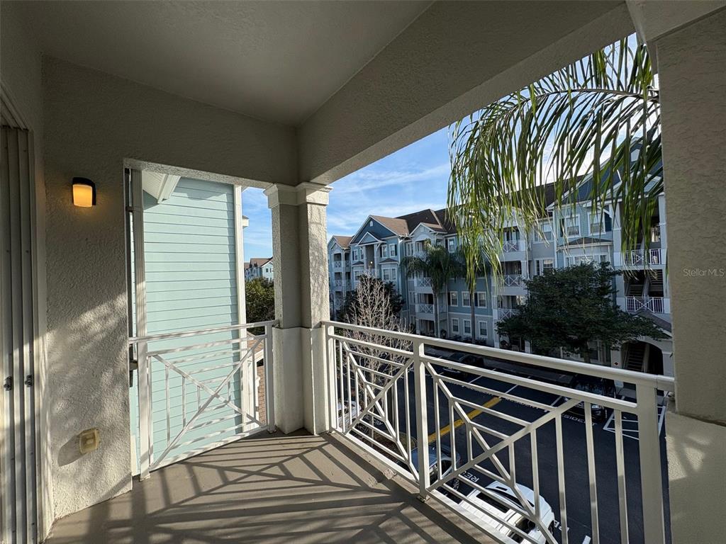 5252 Cane Island Loop, Unit 301 Kissimmee, FL 34746 - Photo 20 of 30 a view of a balcony
