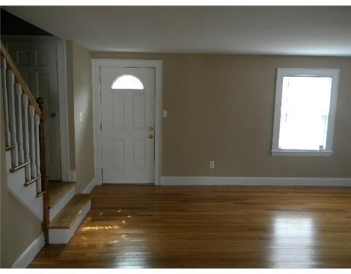 153 Bridgton Road Westbrook, ME 04092 - Photo 4 of 23 Living Room. front entry in living room