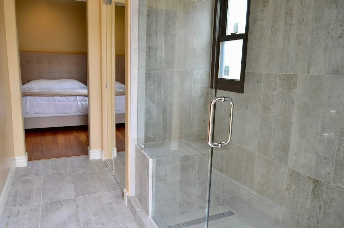 1235 Neptune Avenue Encinitas, CA 92024 - Photo 17 of 32 a en suite bathroom with a shower