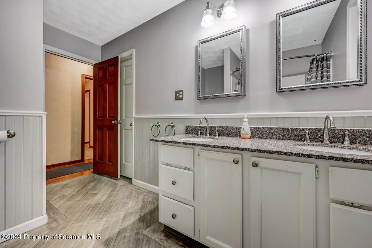 749 Elkview Drive Forest City, PA 18421 - Photo 30 of 73 a bathroom with a sink and a mirror