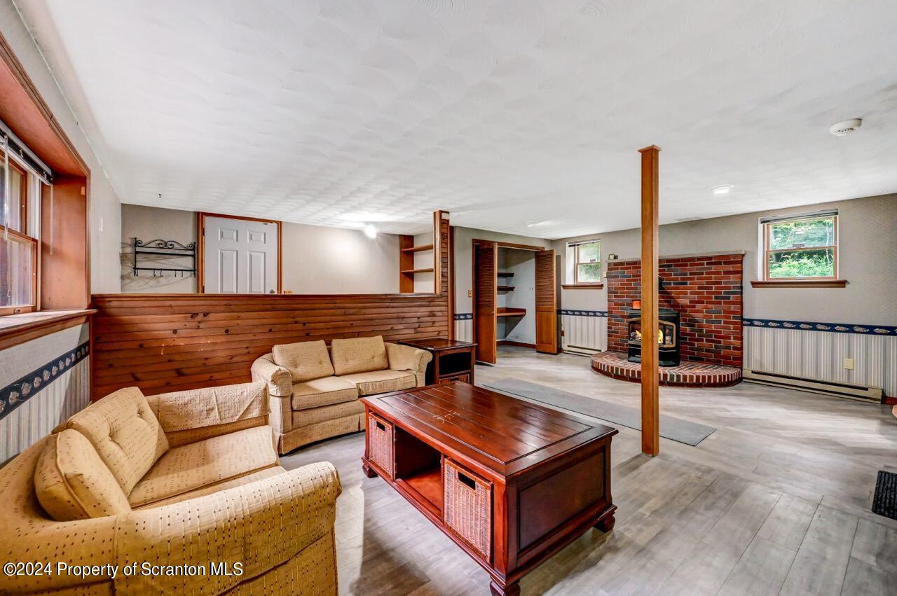 749 Elkview Drive Forest City, PA 18421 - Photo 42 of 73 a living room with furniture and wooden floor
