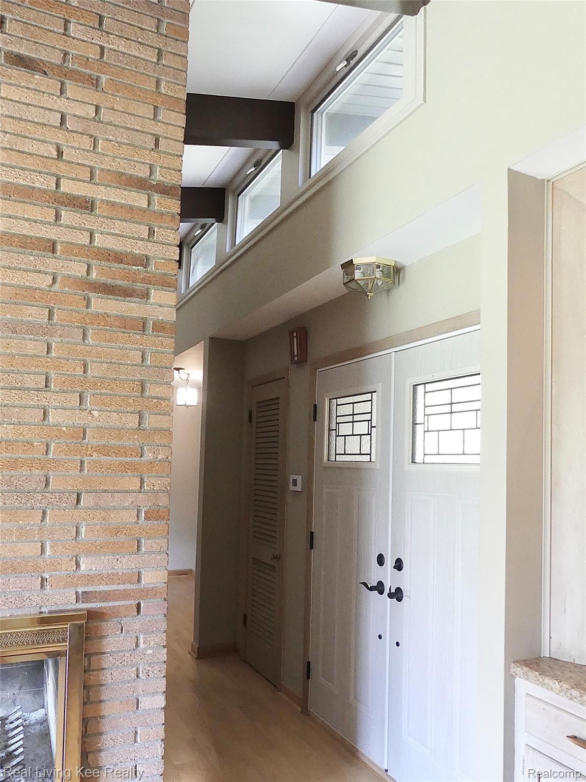 49741 Shelby Road Utica, MI 48317 - Photo 10 of 61 Clerestory windows above front door