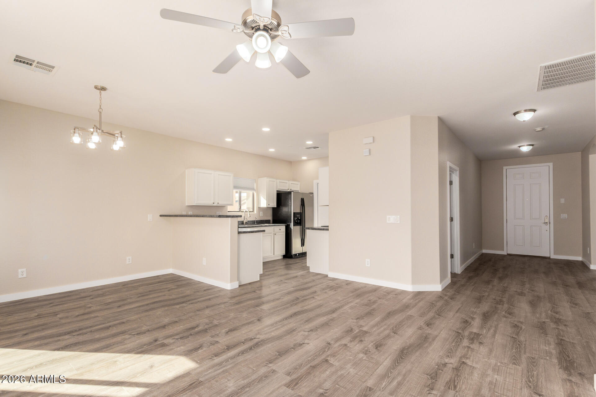 2101 South Meridian Road, Unit 204 Apache Junction, AZ 85120 - Photo 11 of 37 a view of kitchen with refrigerator and microwave