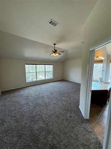 a bathroom with a sink double vanity and a mirror