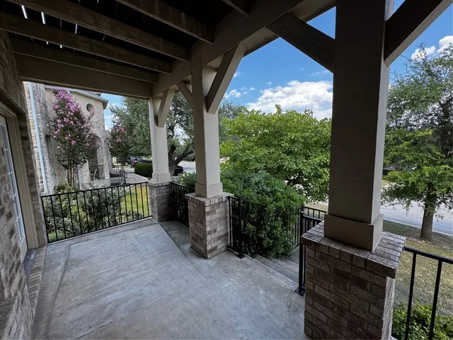 a view of a tree in a yard