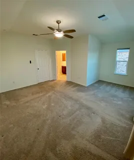 a bathroom with a double vanity sink and a bathtub