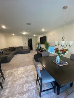 a view of kitchen dining table and chairs