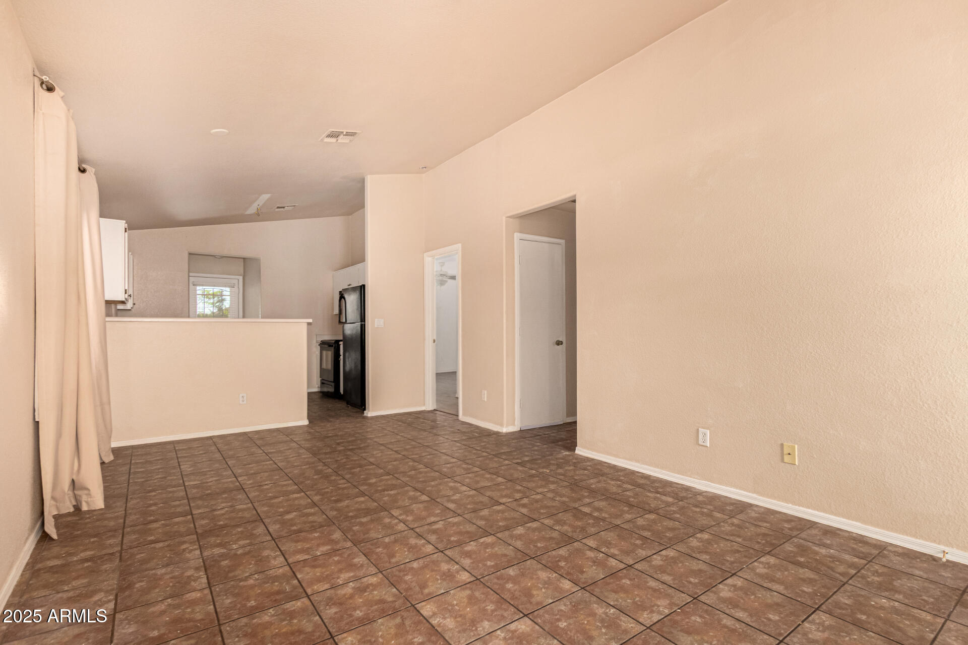2279 West 20th Avenue Apache Junction, AZ 85120 - Photo 11 of 28 a view of a hallway with wooden shelves