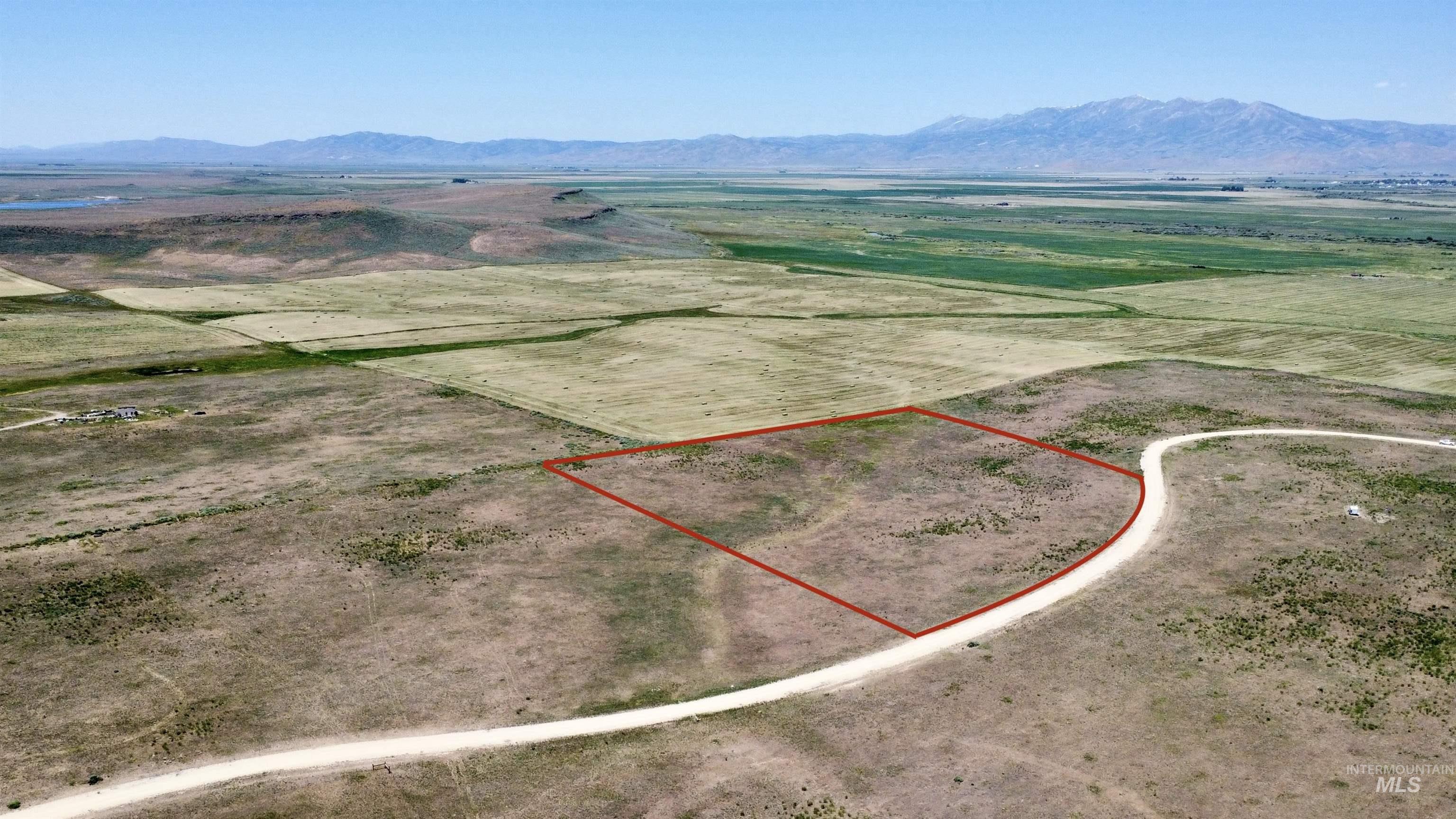 Lot 3 Redtail Lane Fairfield, ID 83327 - Photo 1 of 14 Overview of rural landscape with property parcel outlined and a mountainous background