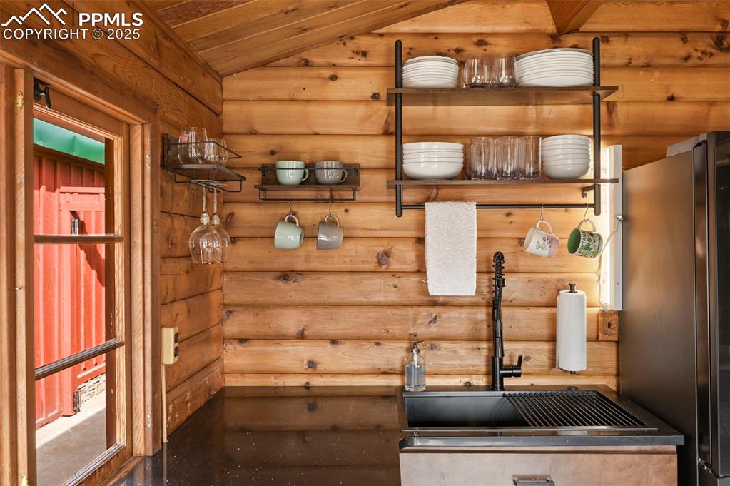 193 Independence Road Cripple Creek, CO 80813 - Photo 13 of 39 a bathroom with a sink and a mirror