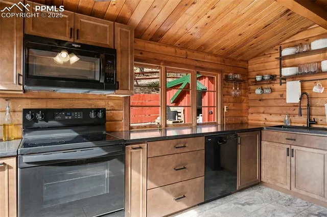 a kitchen with a stove and a microwave