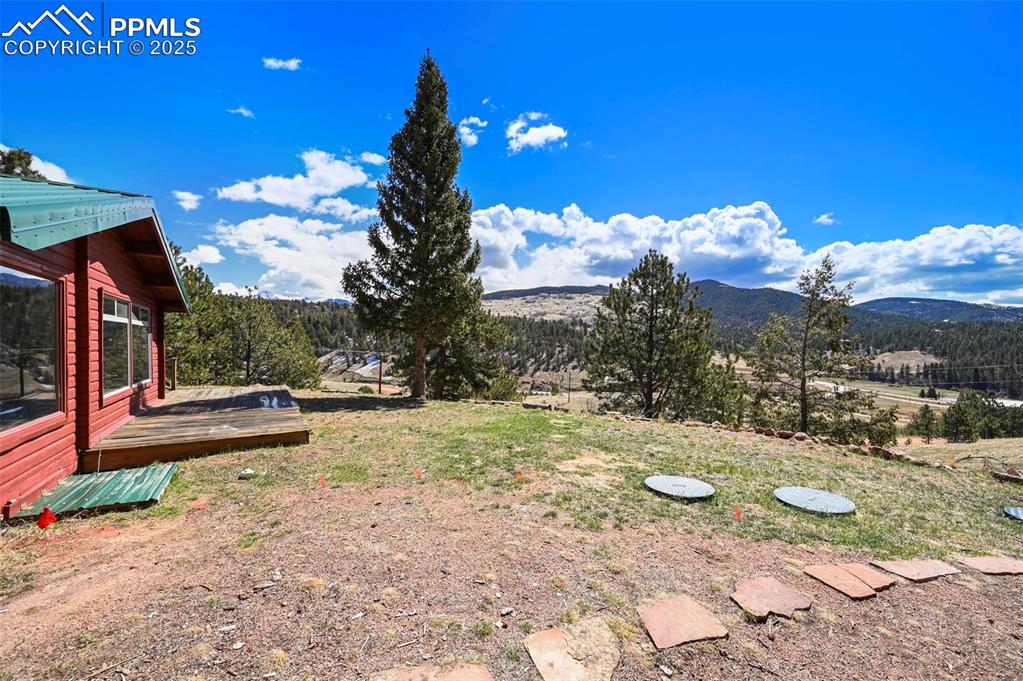 193 Independence Road Cripple Creek, CO 80813 - Photo 28 of 39 a view of a backyard with swimming pool