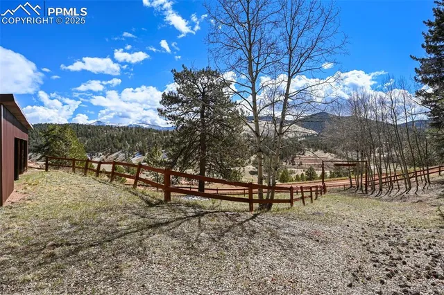 a wooden bench sitting in front of a house