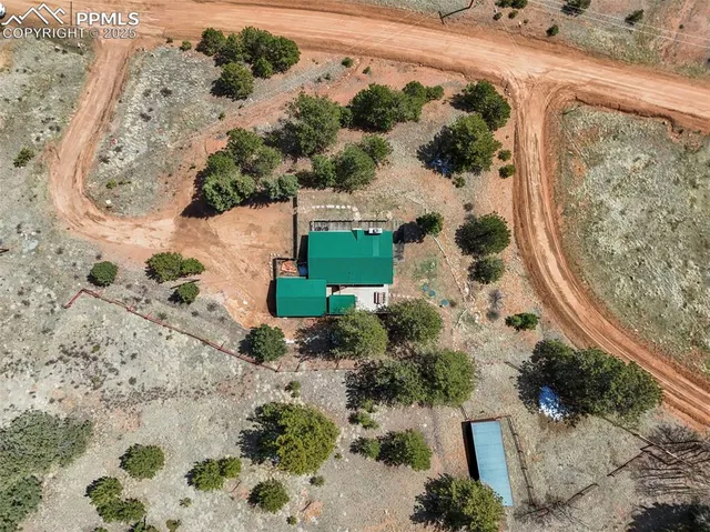 a view of a backyard of a house