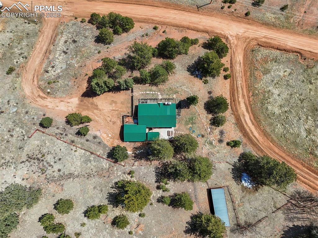 193 Independence Road Cripple Creek, CO 80813 - Photo 37 of 39 an aerial view of a house with a yard
