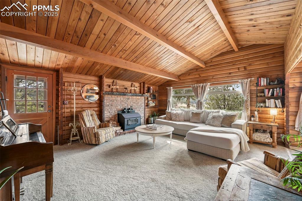 193 Independence Road Cripple Creek, CO 80813 - Photo 6 of 39 a living room with furniture large window and outer view