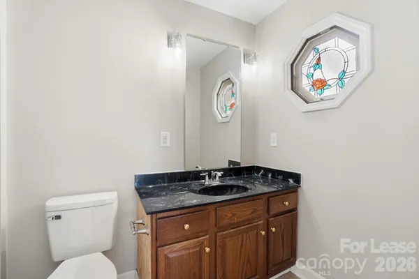 a white bath tub sitting next to a white toilet