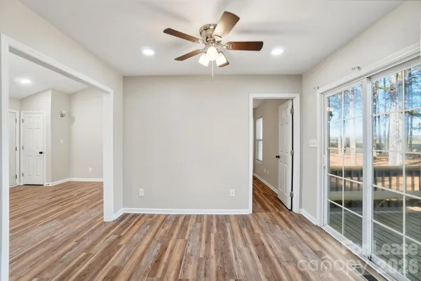 a kitchen with a refrigerator and a sink