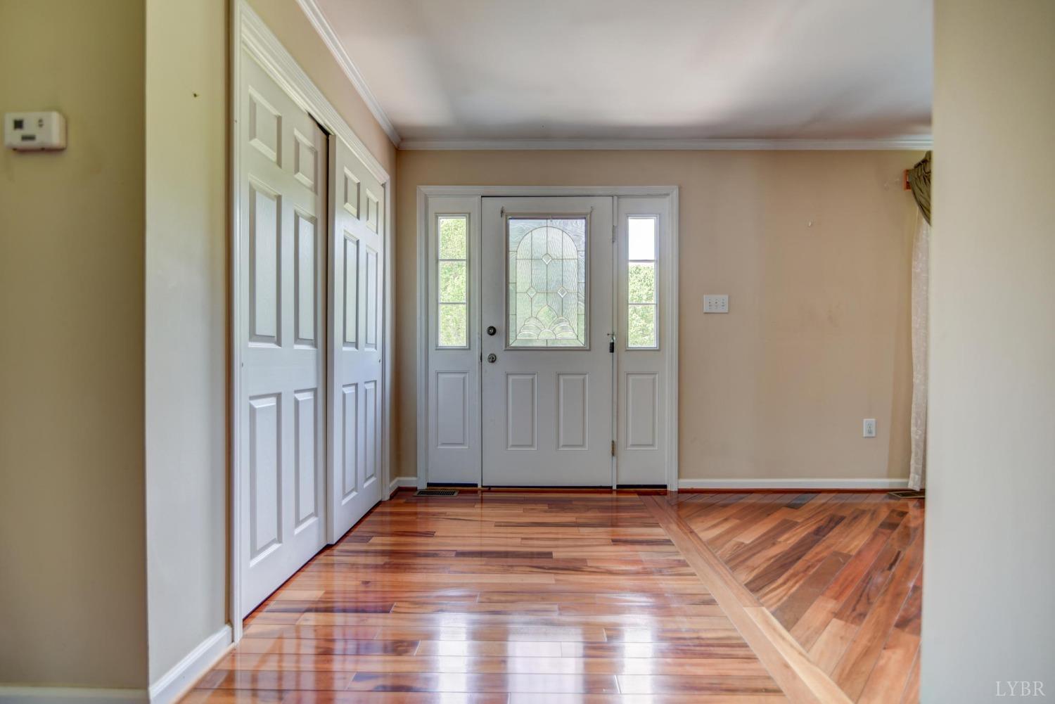 6835 Level Run Road Long Island, VA 24569 - Photo 3 of 57 a view of a room with wooden floor and entryway