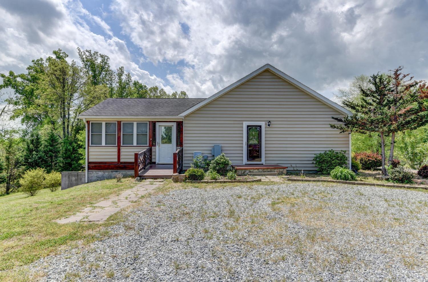 6835 Level Run Road Long Island, VA 24569 - Photo 50 of 57 a view of a house with backyard and sitting area