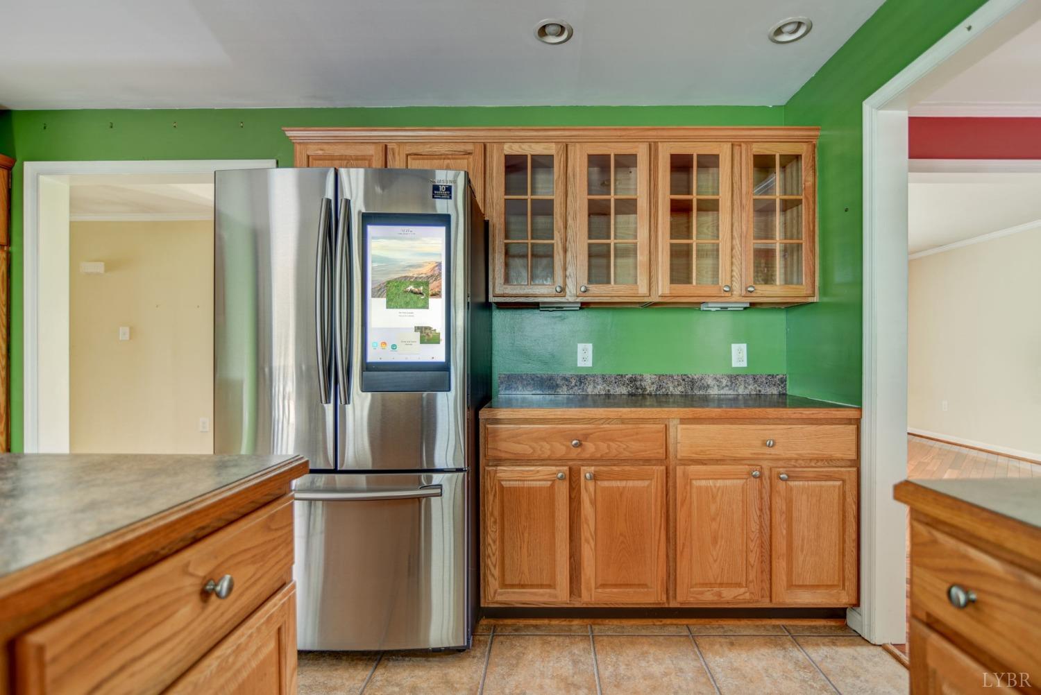 6835 Level Run Road Long Island, VA 24569 - Photo 10 of 57 a kitchen with a refrigerator and washer
