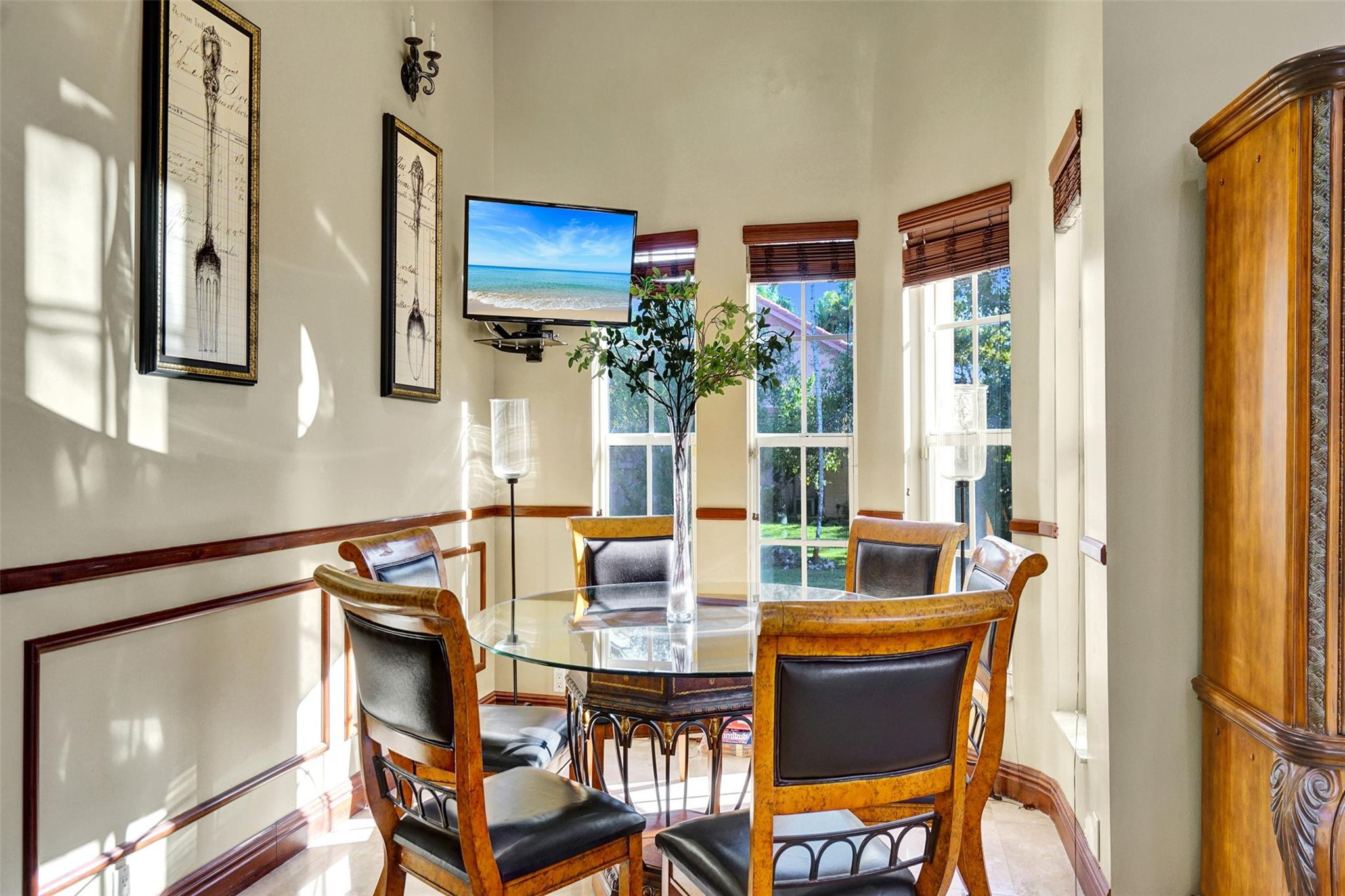 3151 Southwest 135th Terrace Davie, FL 33330 - Photo 23 of 74 a dining room with furniture and a potted plant