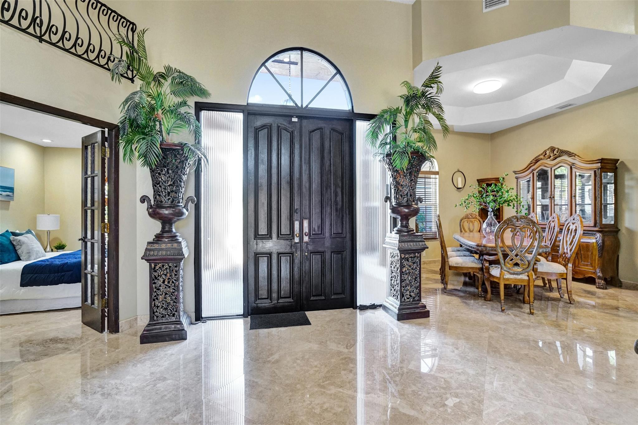 3151 Southwest 135th Terrace Davie, FL 33330 - Photo 32 of 74 a view of living room kitchen and entryway