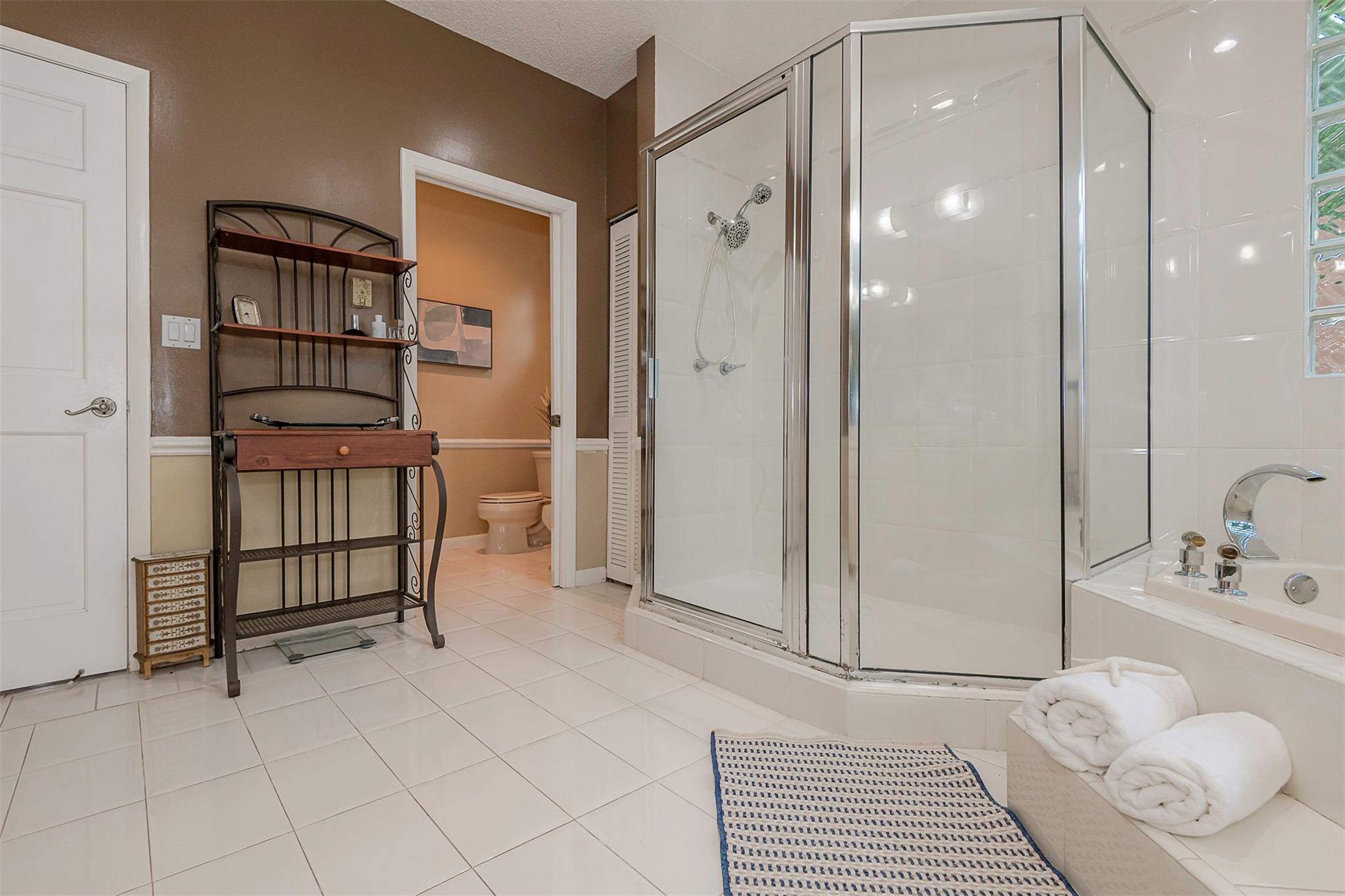 3151 Southwest 135th Terrace Davie, FL 33330 - Photo 42 of 74 a bedroom with a bed and a shower