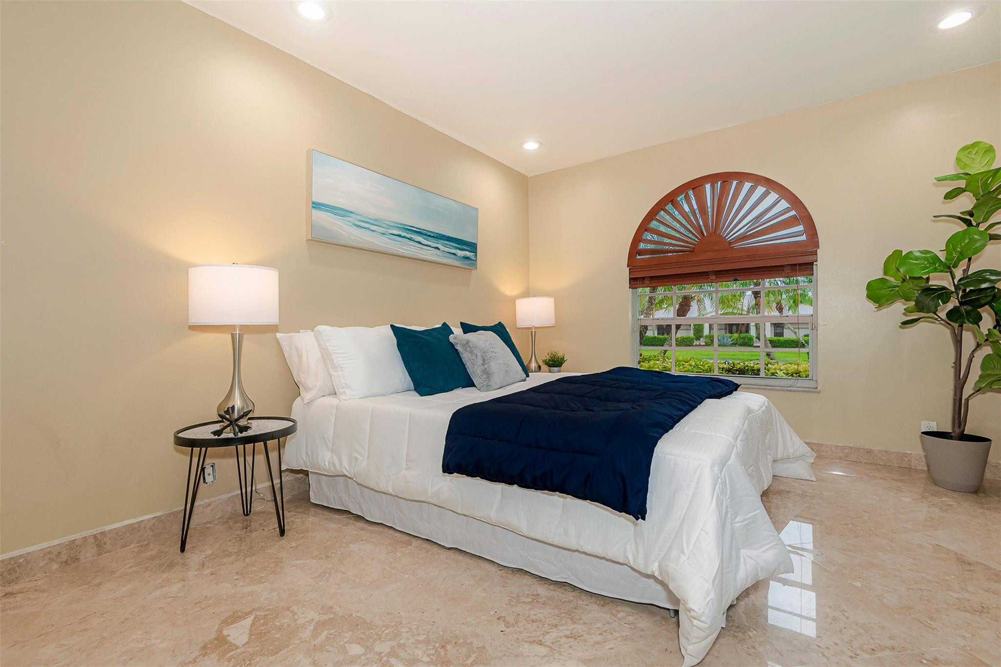 3151 Southwest 135th Terrace Davie, FL 33330 - Photo 46 of 74 a bedroom with a bed and a lamp