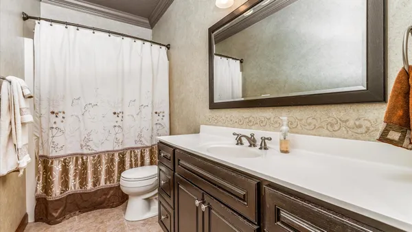 a bathroom with a sink a toilet and a bathtub