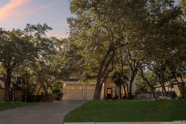 a view of house with yard