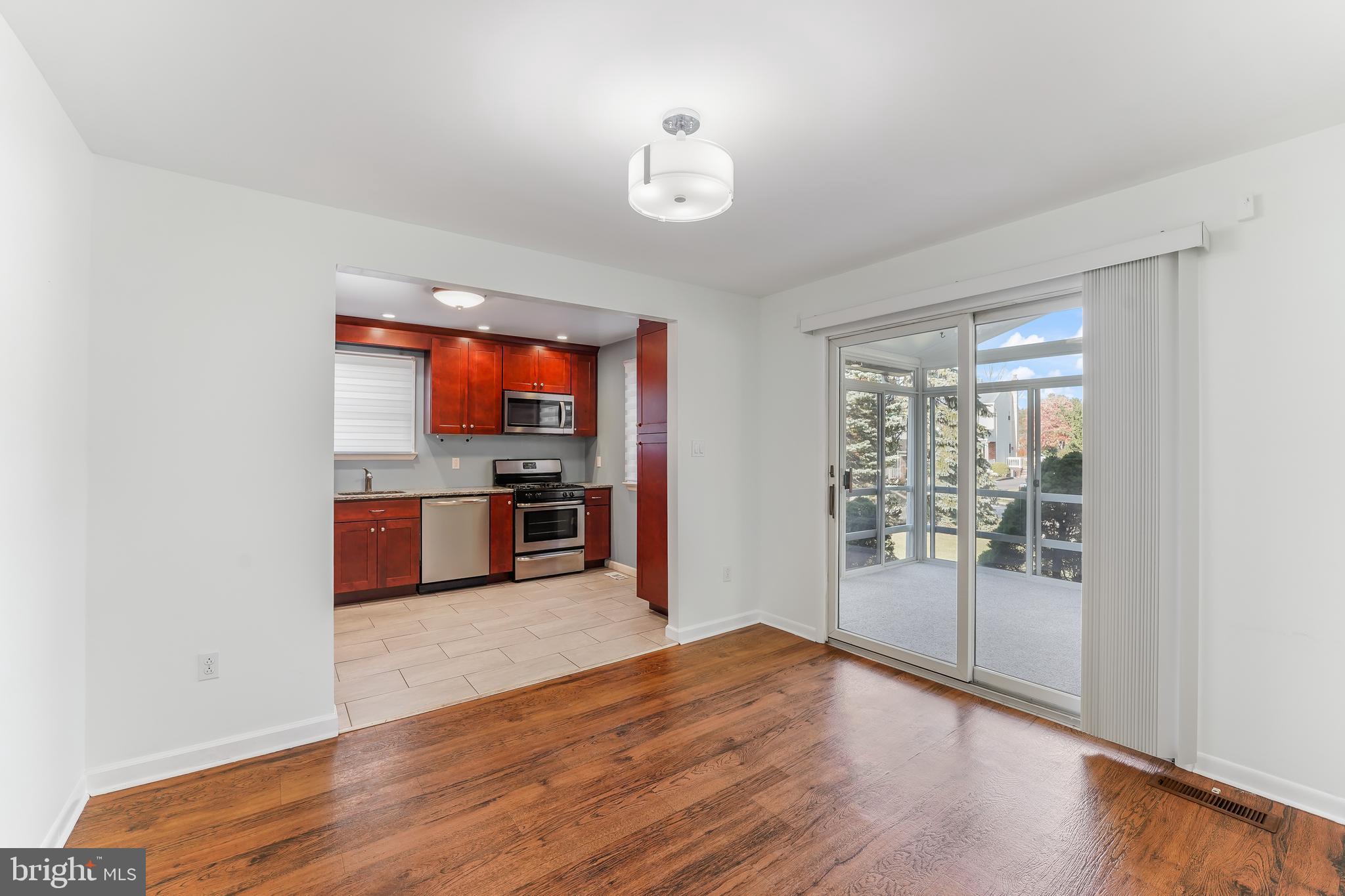 140 Cherry Lane Folsom, PA 19033 - Photo 11 of 35 Sliders to Sun Room
