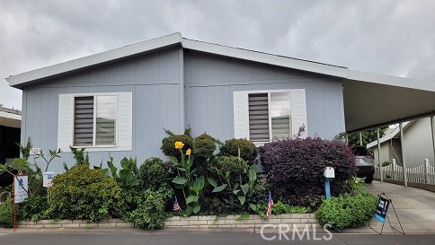 a house view with a garden space